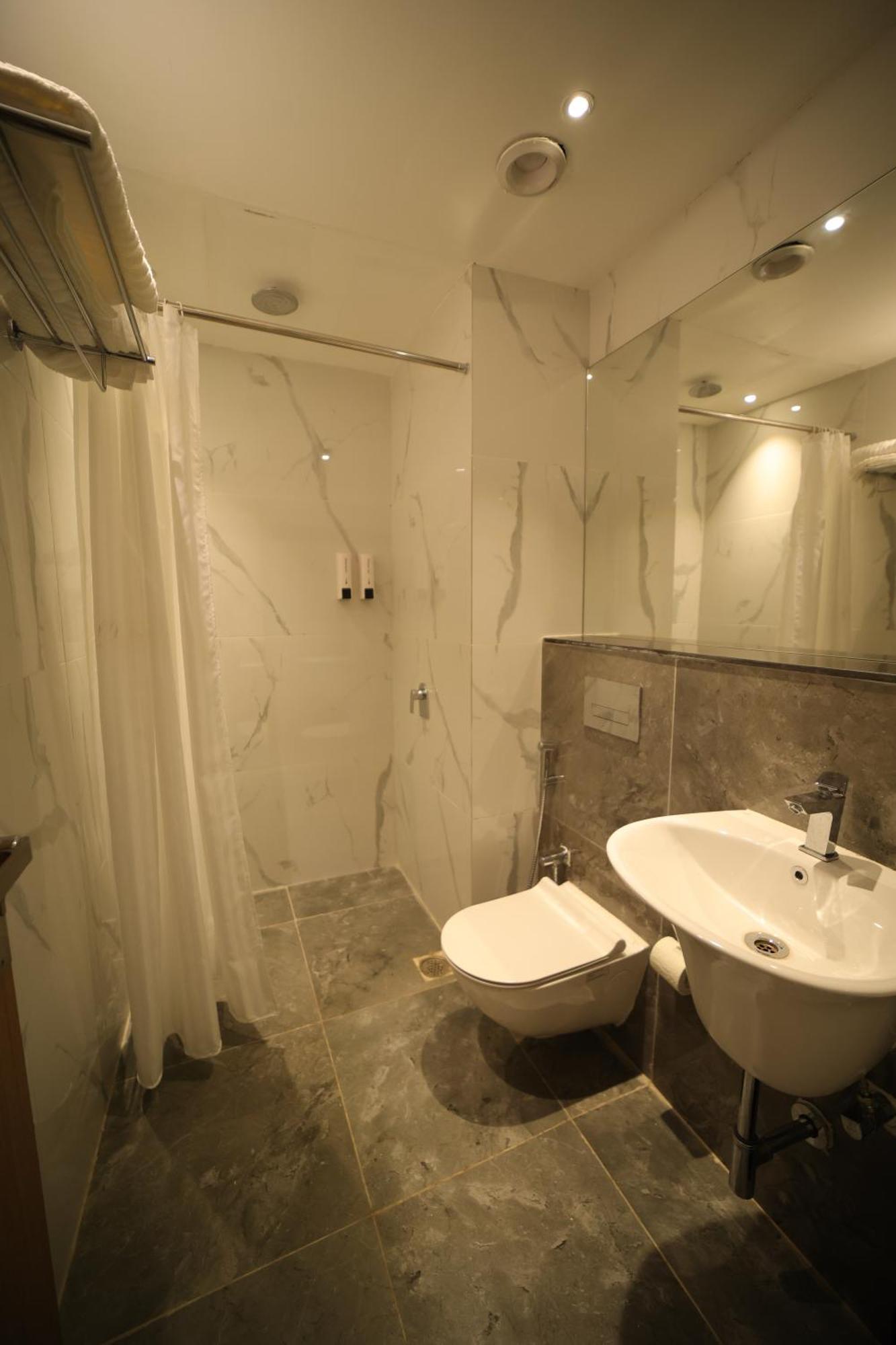Hotel Marigold Бхубанешвара Номер фото